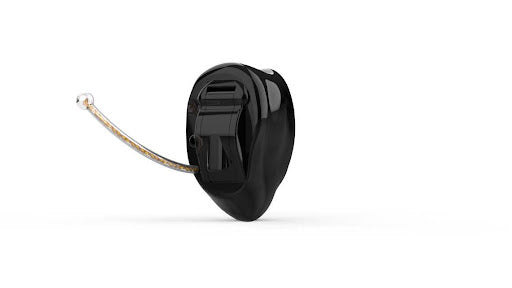 Black Starkey in-ear hearing aid with a sleek, compact design.